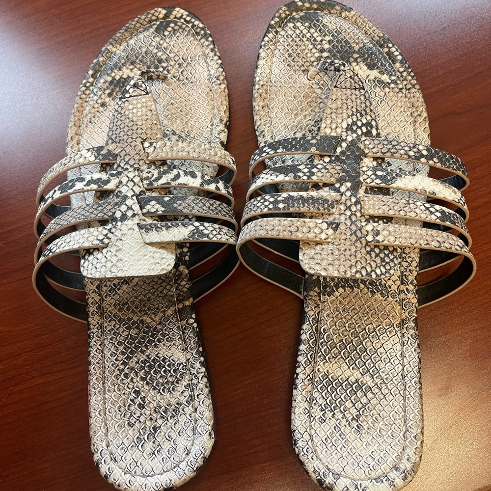 Snake skin sandals.